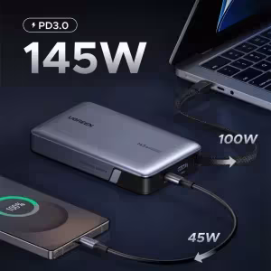 Power Bank UGREEN PB551 cargando laptop y smartphone con 145W